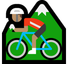 Person Mountain Biking Emoji with Medium Skin Tone, Microsoft style