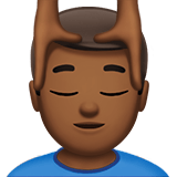 Man Getting Massage Emoji with Medium-Dark Skin Tone, Apple style
