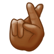 Crossed Fingers Emoji with Medium-Dark Skin Tone, Samsung style
