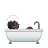 Person Taking Bath Emoji with Dark Skin Tone, Google style