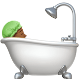 Person Taking Bath Emoji with Medium-Dark Skin Tone, Apple style