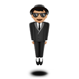 Man in Suit Levitating Emoji with Medium-Light Skin Tone, Apple style
